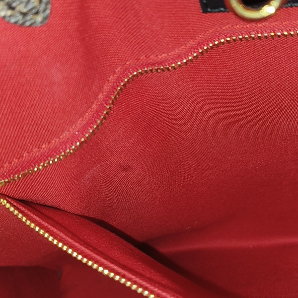 ONTHEGO GM Monogram Coated Canvas Brown