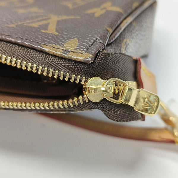 POCHETTE ACCESSOIRES GM Monogram Coated Canvas Brown