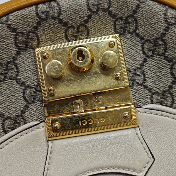 Padlock Small Monogram Coated Canvas Beige