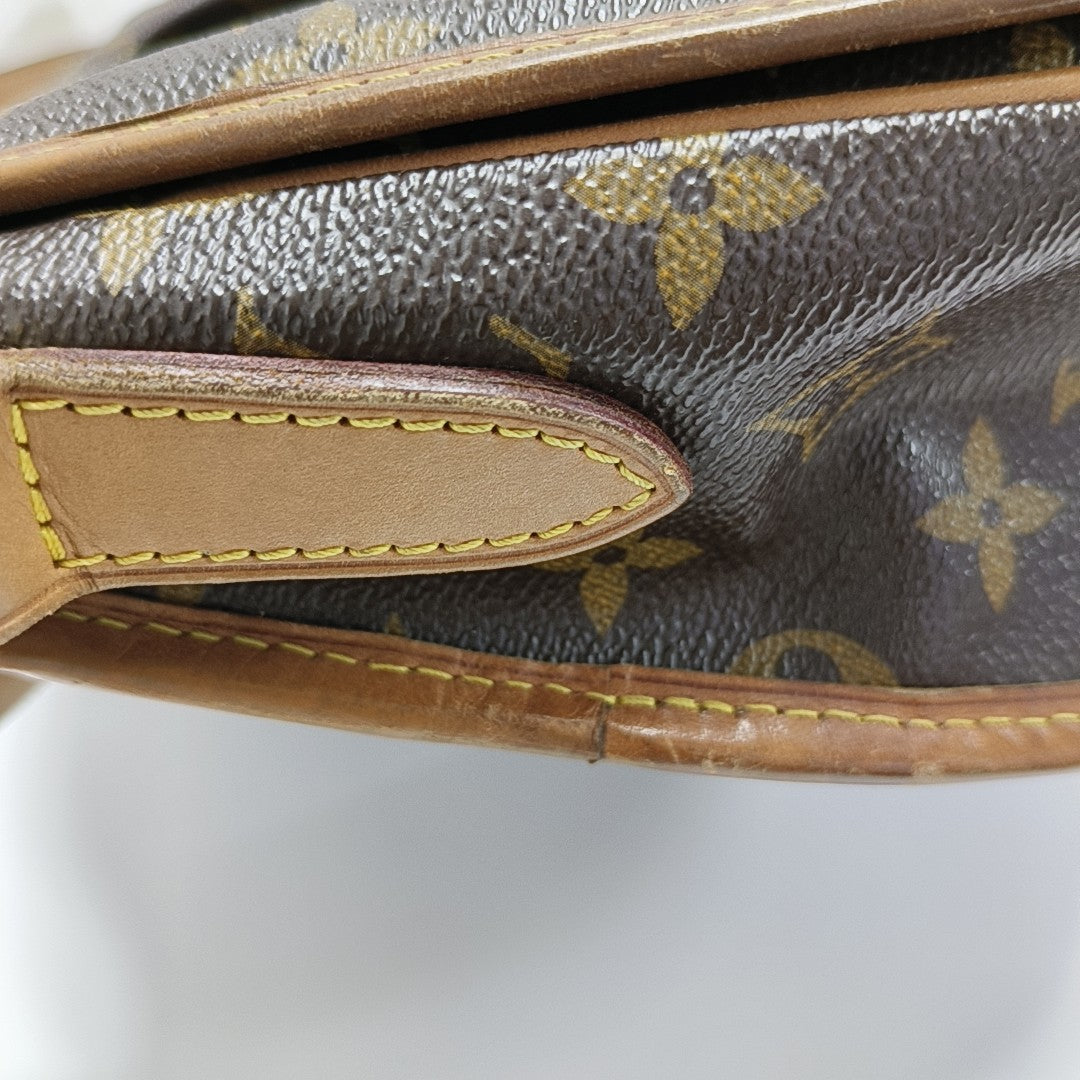 MENILMONTANT PM Monogram Coated Canvas Brown