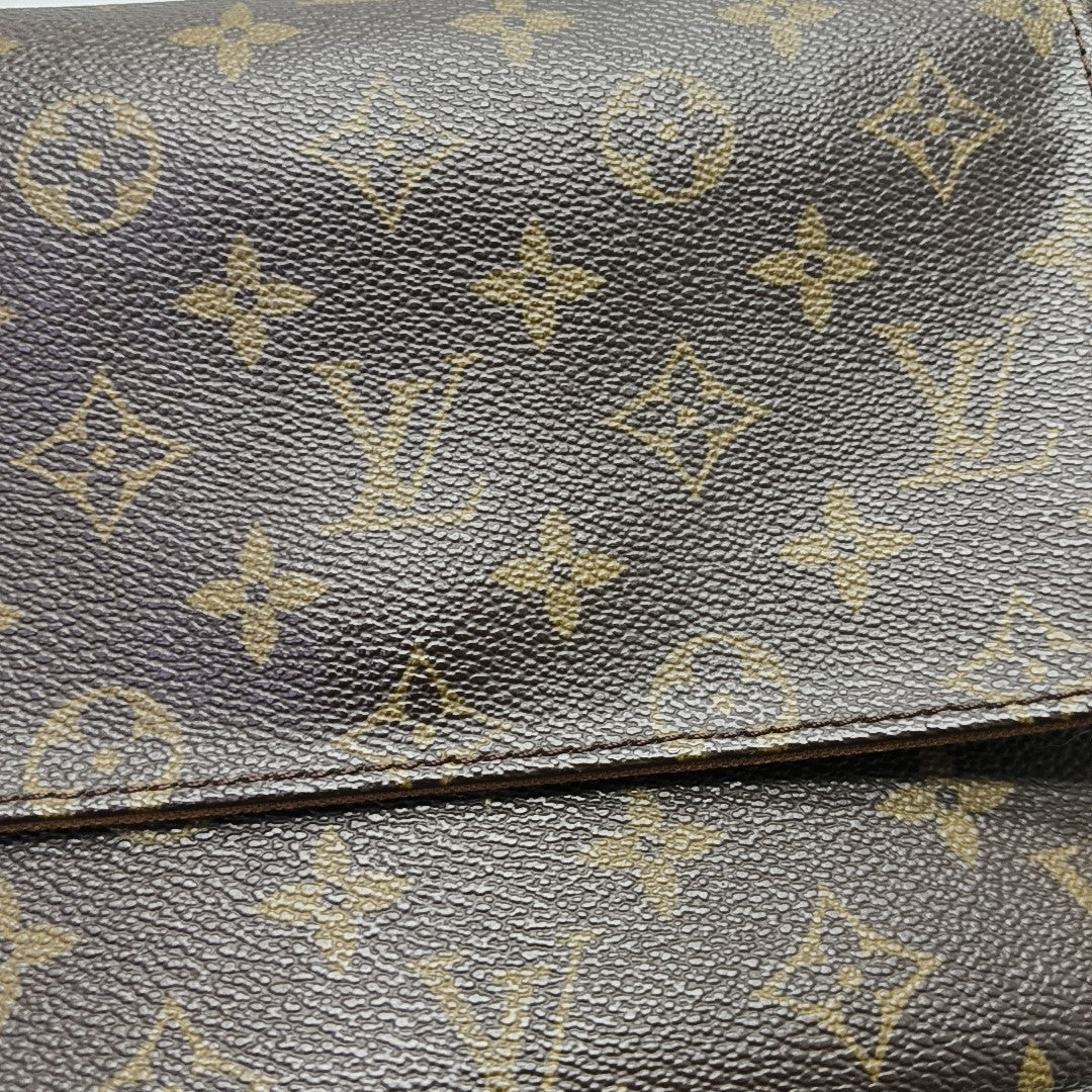 LOOPING PM Monogram Coated Canvas Brown