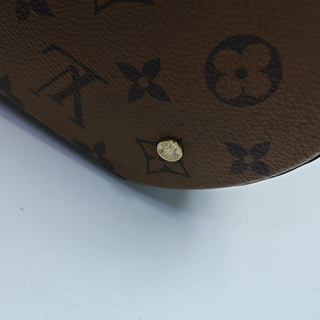 CANNES PM Monogram Coated Canvas Brown