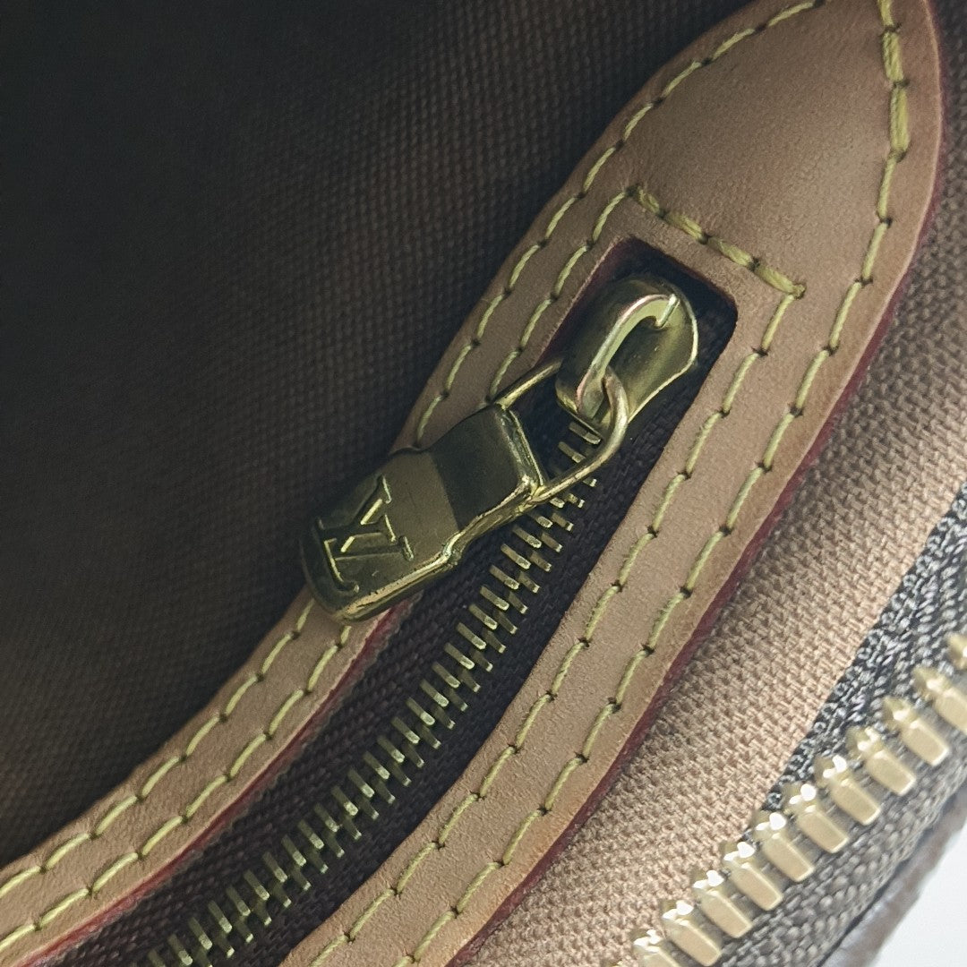 SPEEDY 25 Monogram Coated Canvas Brown