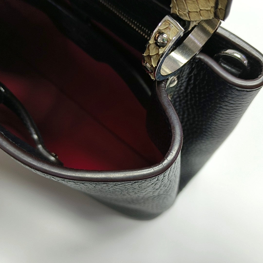 Authenticated pre-owned  CAPUCINES BB Calfskin Black - Shoulder Bag at Looply