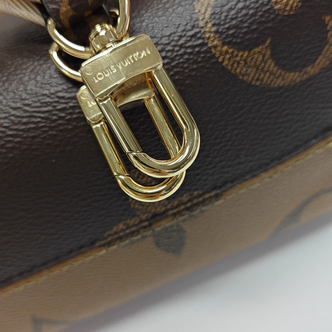 ONTHEGO PM Monogram Coated Canvas Brown