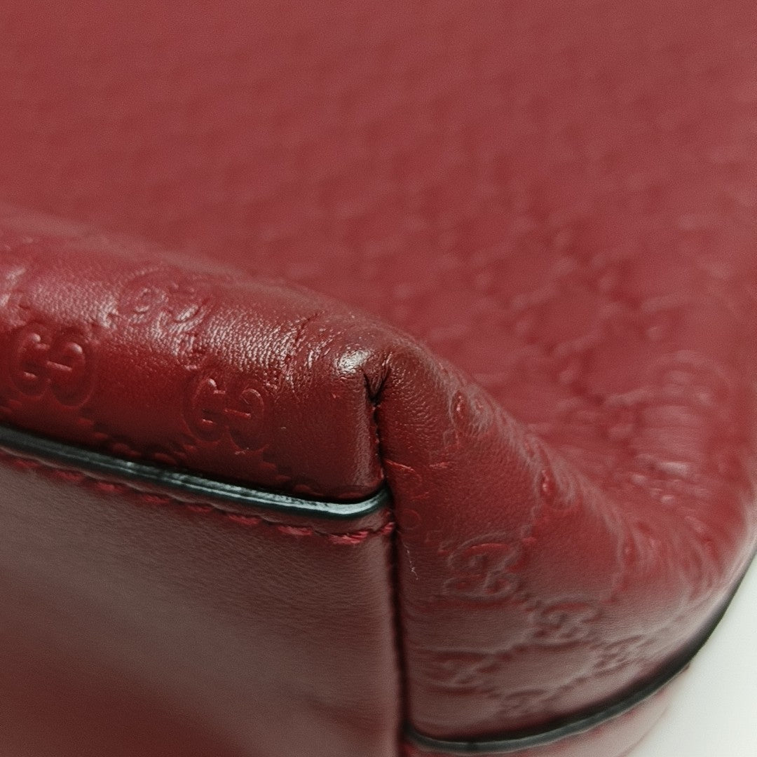Monogram Calfskin Top Handle Bag Red