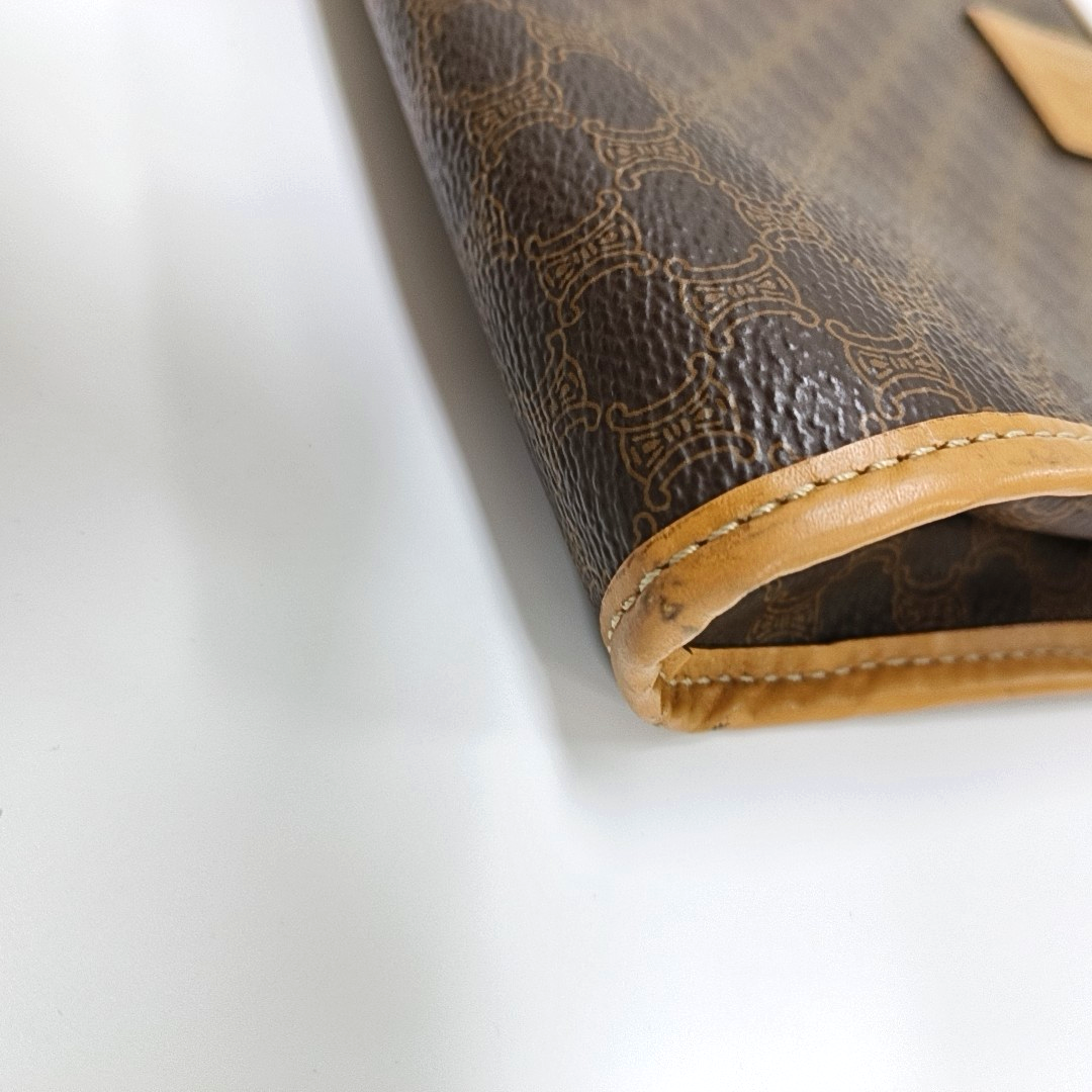 Authenticated pre-owned  MACADAM CLUTCHE Coated Canvas Brown - Clutch at Looply