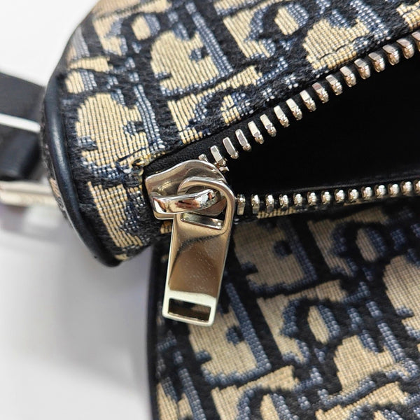 Authenticated pre-owned  Saddle Medium Oblique Canvas Blue - Crossbody Bag at Looply