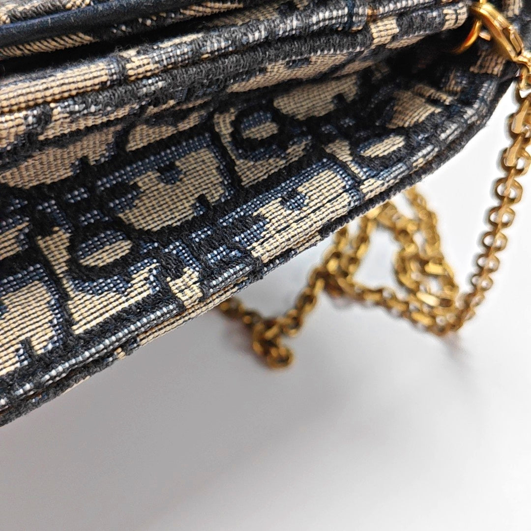 Authenticated pre-owned  Saddle Monogram Canvas Blue - Shoulder Bag at Looply