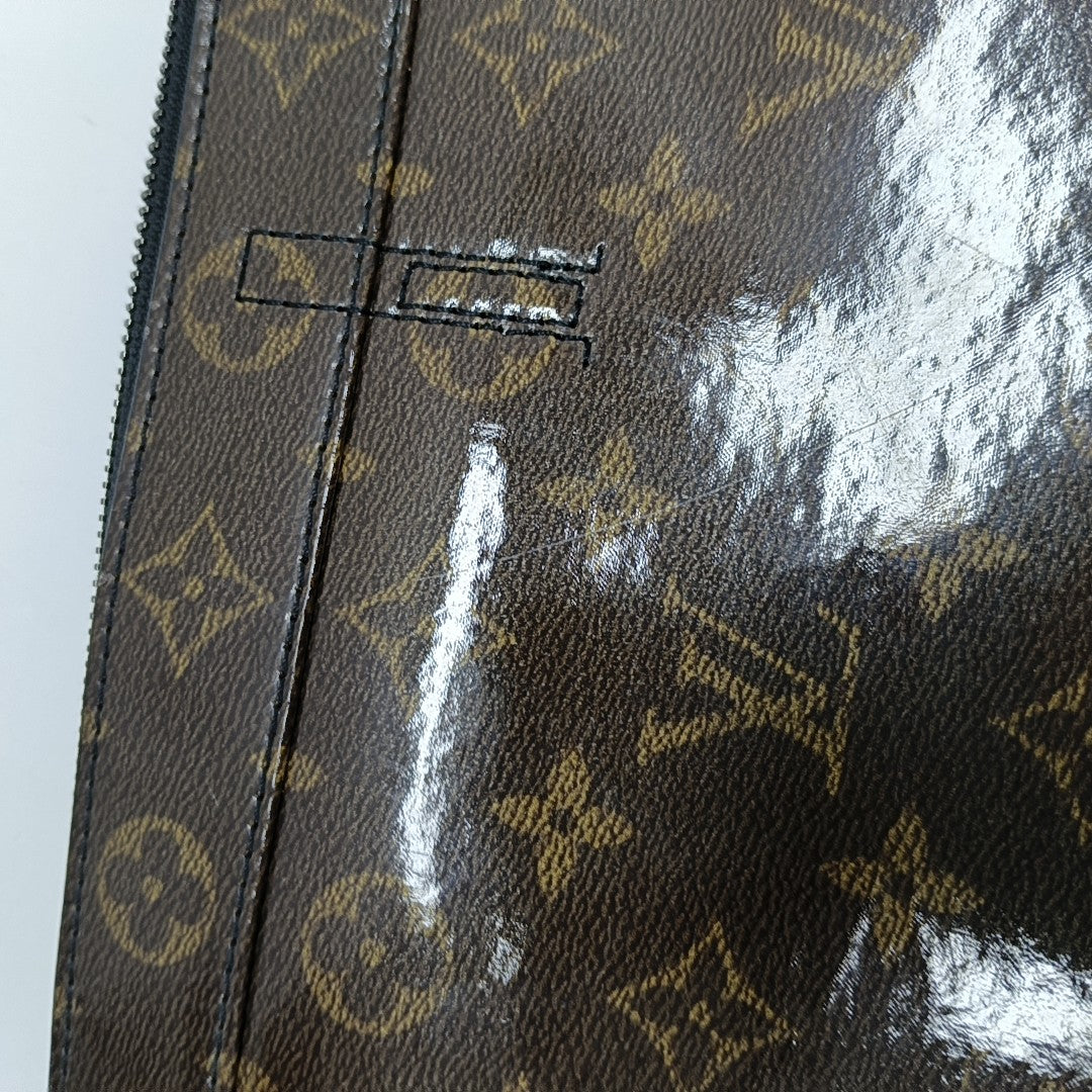 EXPLORER Monogram Coated Canvas Brown