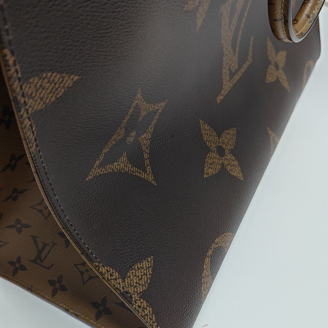 ONTHEGO GM Monogram Coated Canvas Brown