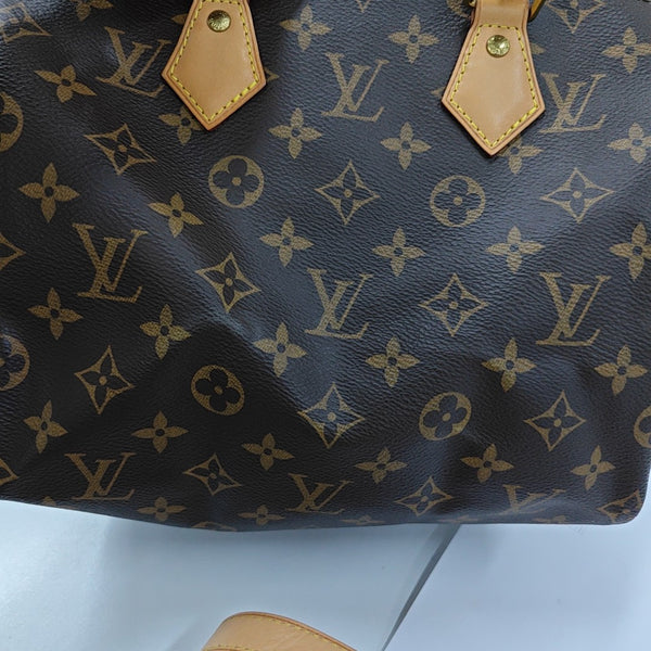 SPEEDY 25 Monogram Coated Canvas Brown