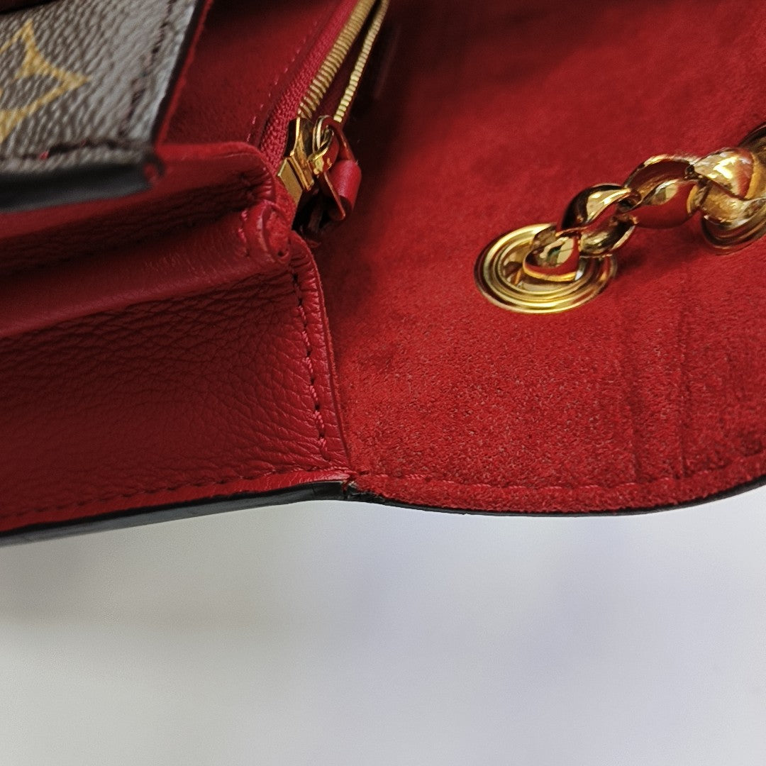 VICTOIRE Monogram Coated Canvas Brown