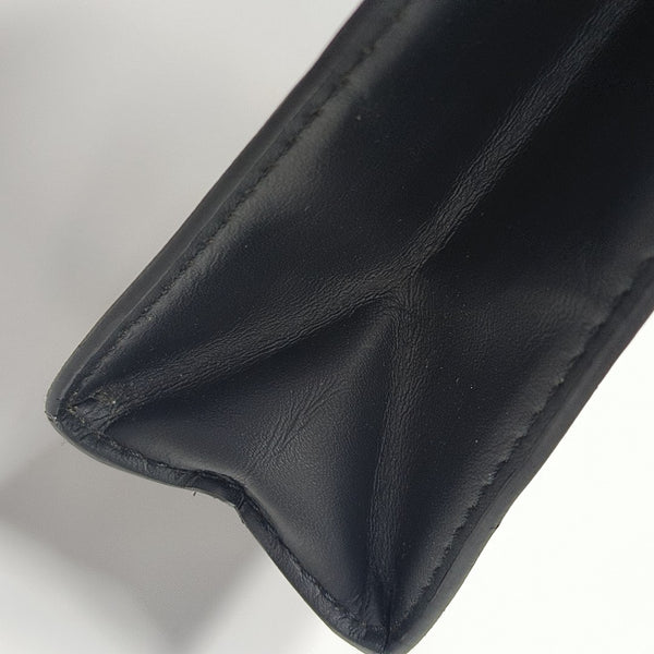Pochette Voyag MM Monogram Coated Canvas Black
