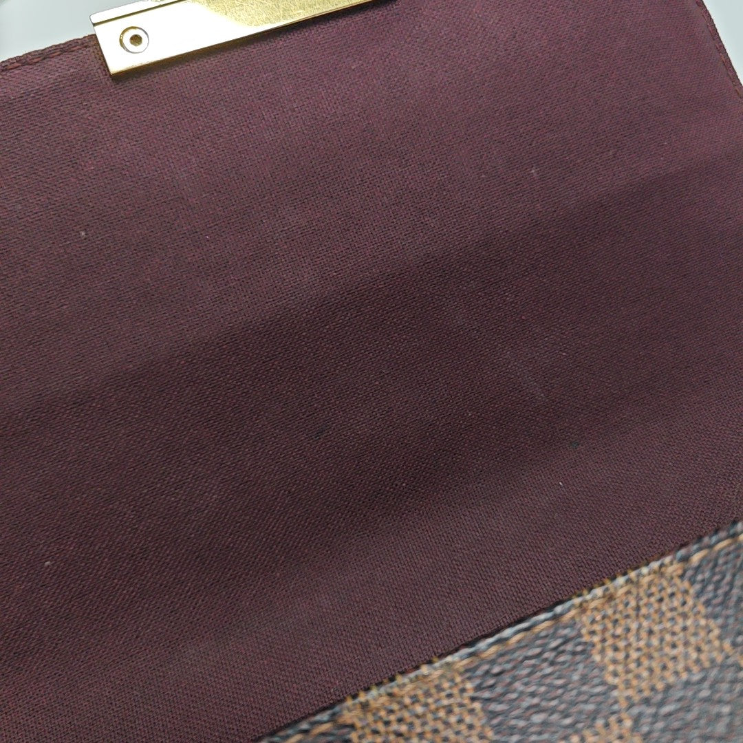 FAVORITE PM Coated Canvas Brown