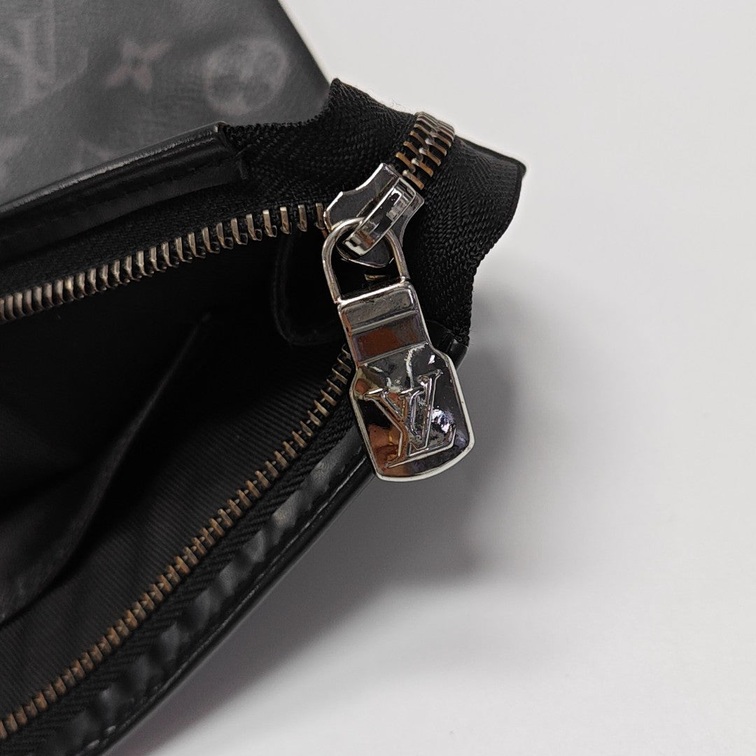 Pochette Voyag MM Monogram Coated Canvas Black
