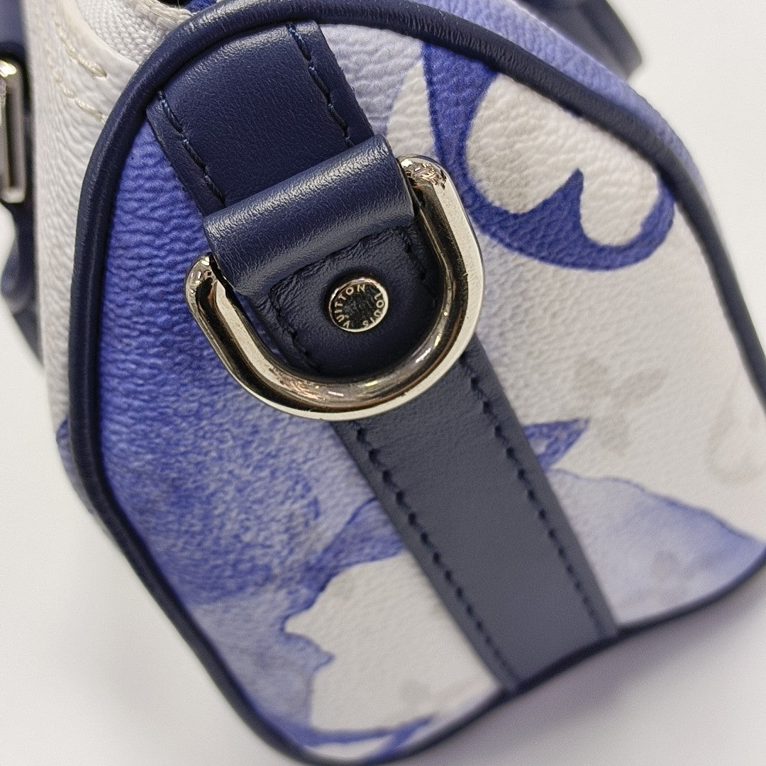 Authenticated pre-owned  KEEPALL Nano Monogram Coated Canvas Blue - Shoulder Bag at Looply