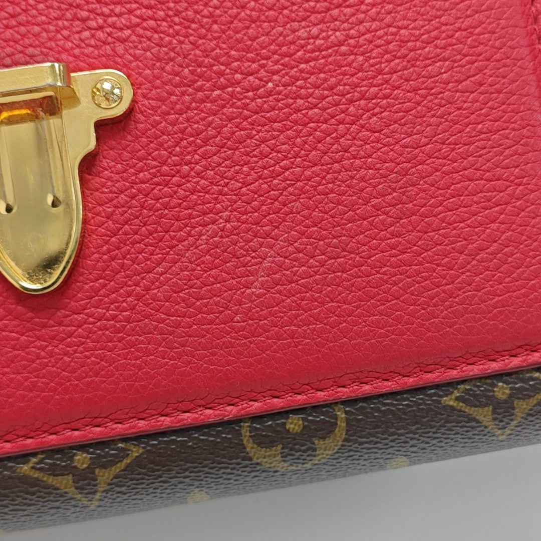 VICTOIRE Monogram Coated Canvas Brown