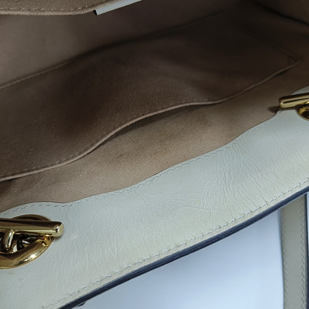 Padlock Small Monogram Coated Canvas Beige
