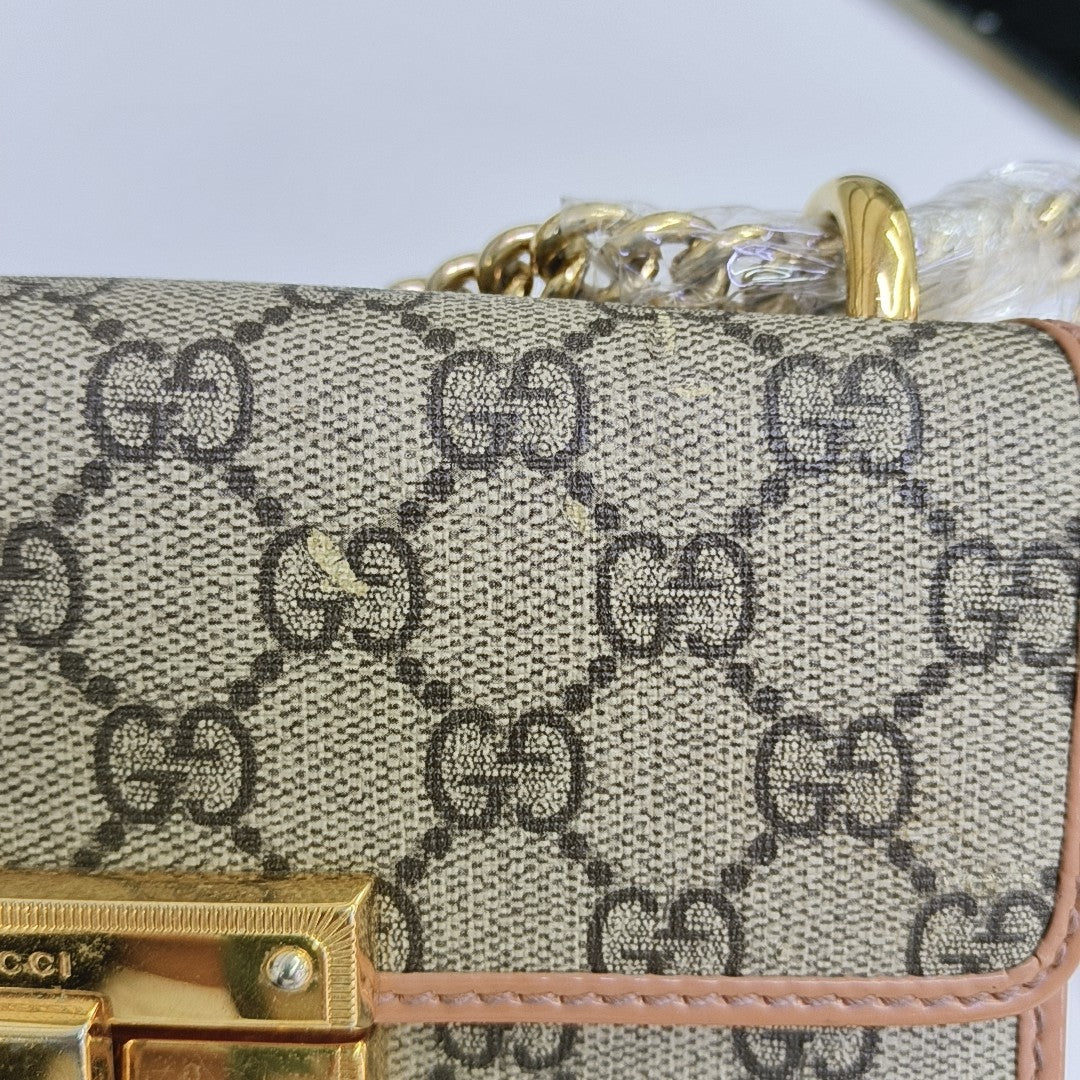 Candado pequeño Monogram lona revestida beige