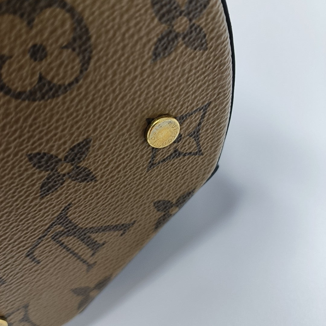 CANNES PM Monogram Coated Canvas Brown