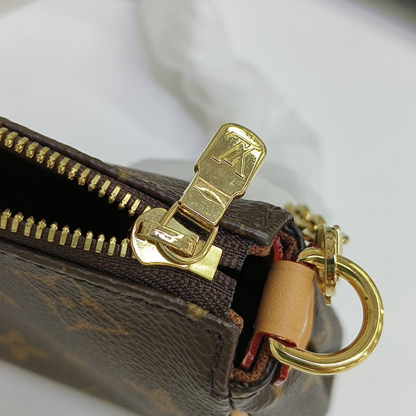 Pochette Eva Monogram Coated Canvas Brown