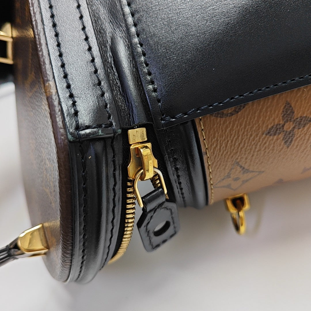 CANNES PM Monogram Coated Canvas Brown