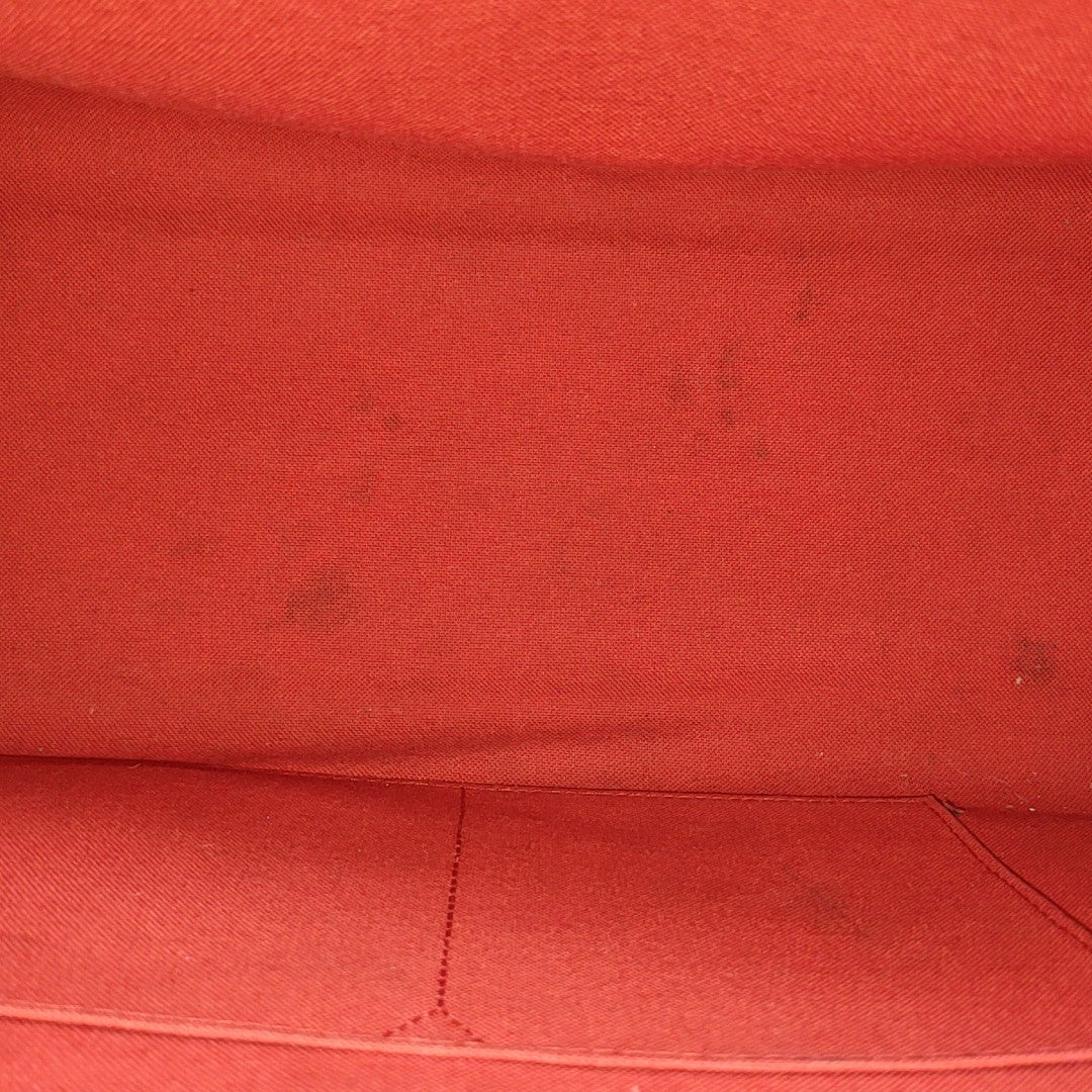 ONTHEGO MM Monogram Coated Canvas Brown
