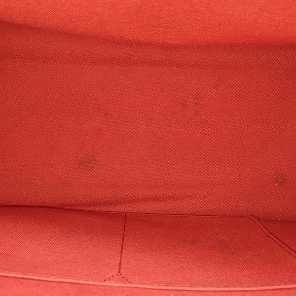 ONTHEGO MM Monogram Coated Canvas Brown