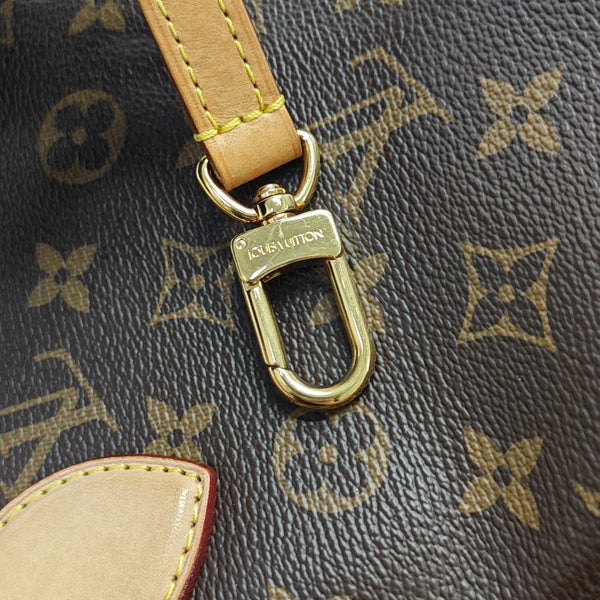 RIVOLI MM Monogram Coated Canvas Brown