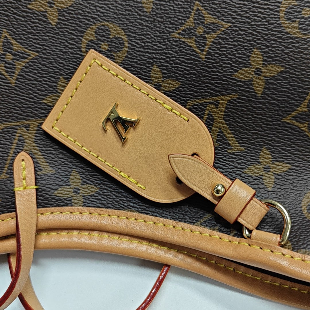 CARRYALL PM Monogram Coated Canvas Brown