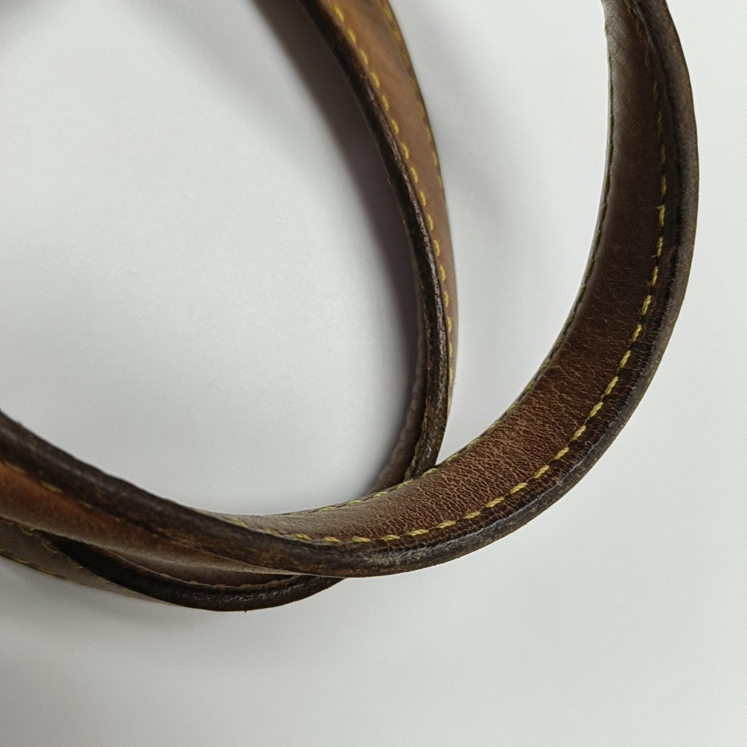 EXCENTRI-CITE Monogram Coated Canvas Brown