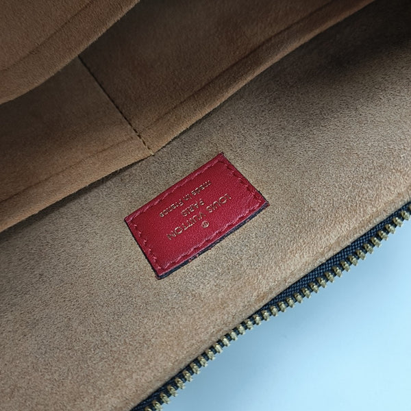TUILERIES Monogram Coated Canvas Brown