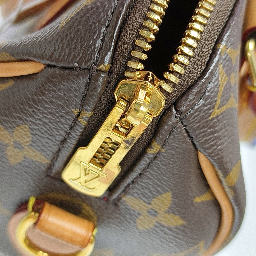 SPEEDY 20 Monogram Coated Canvas Brown
