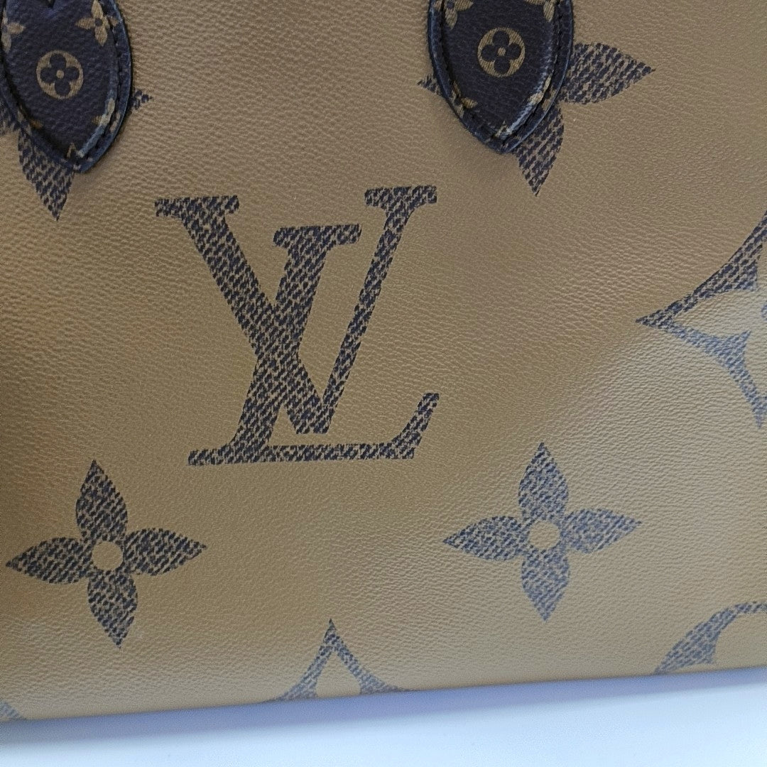 ONTHEGO MM Monogram Coated Canvas Brown