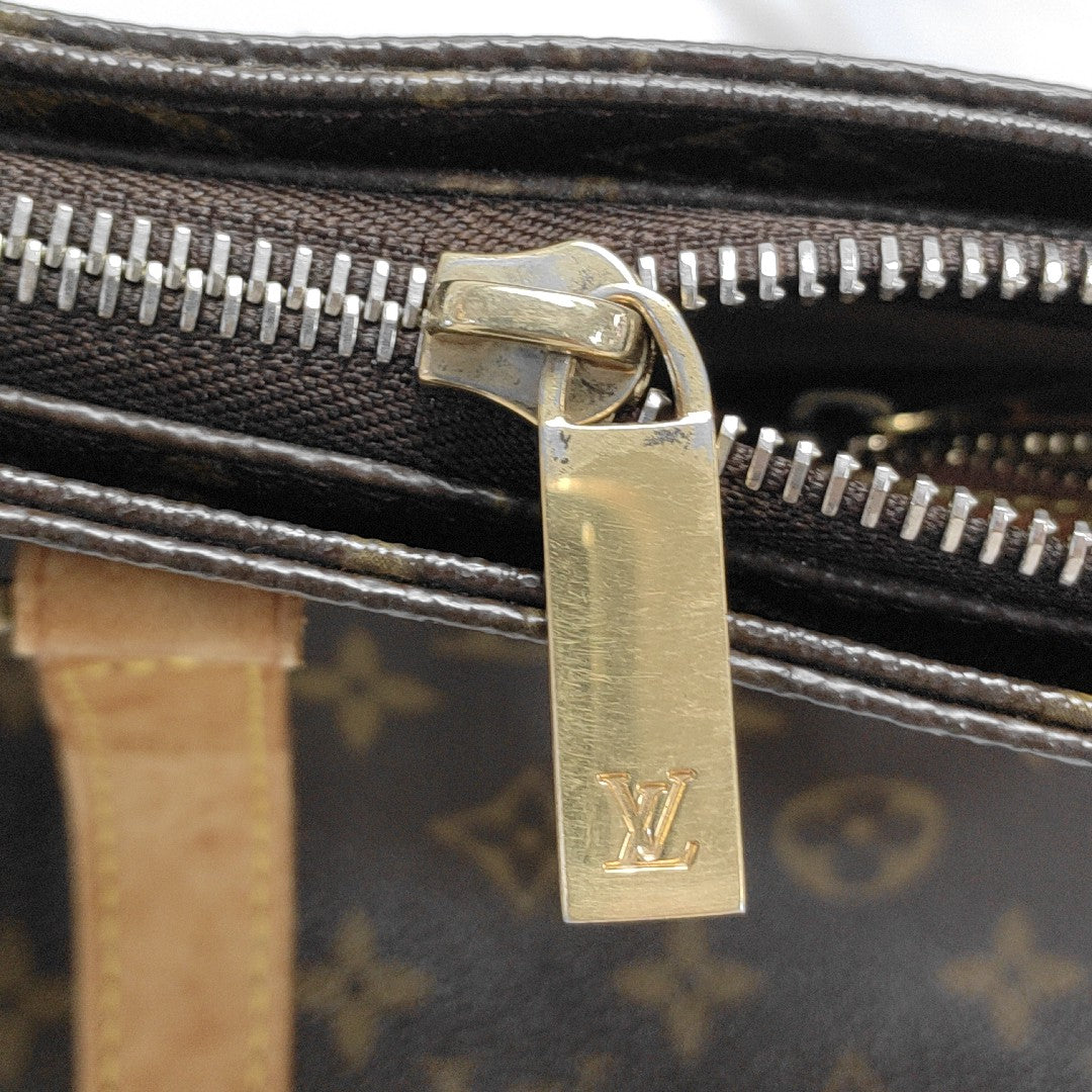 PIANO Monogram Coated Canvas Brown