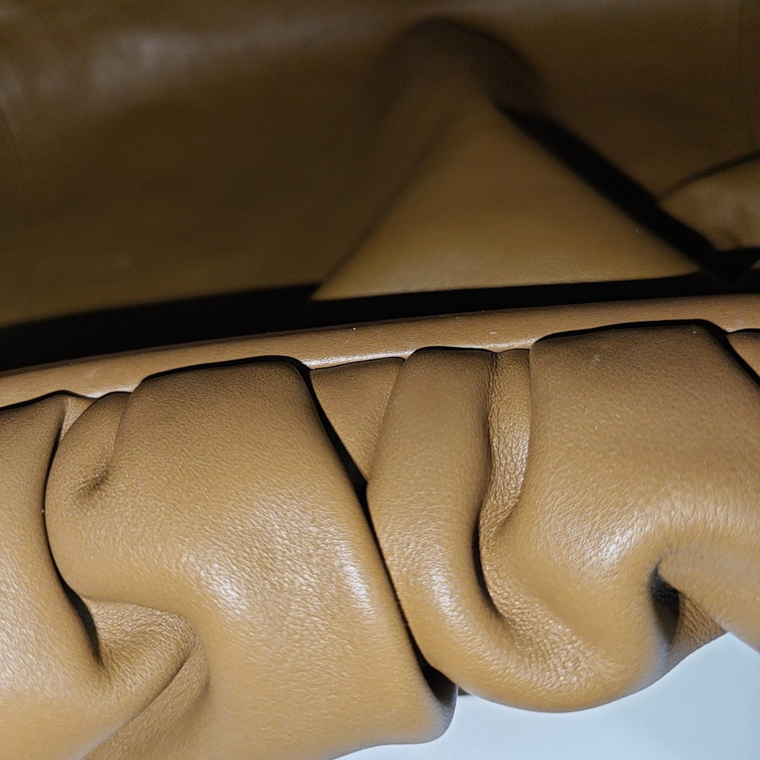 Authenticated pre-owned  The Pouch Calfskin Brown - Top Handle Bag at Looply