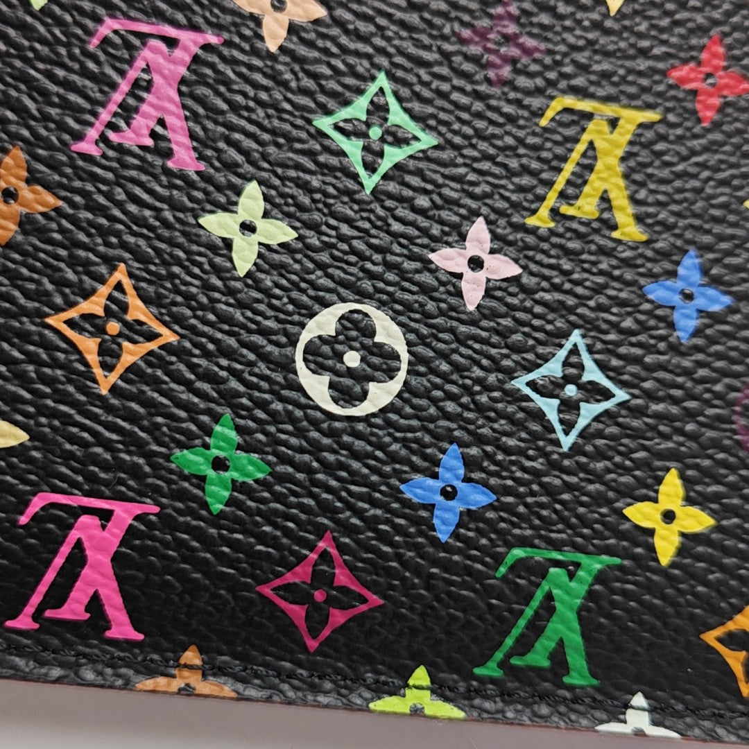 LV × TM ZIPPY Monogram Coated Canvas Black