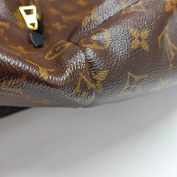Authenticated pre-owned  PALM SPRINGS MM Monogram Coated Canvas Brown - Backpack at Looply