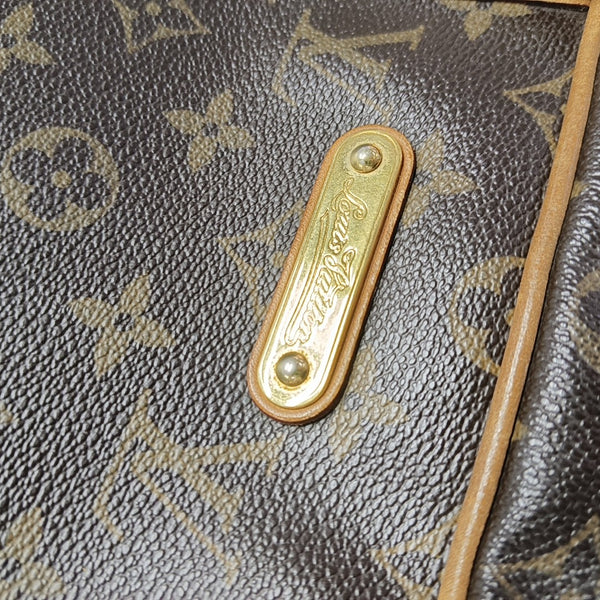 MONTORGUEI Monogram Coated Canvas Brown