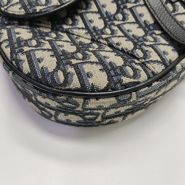 Authenticated pre-owned  Saddle Medium Oblique Canvas Blue - Crossbody Bag at Looply