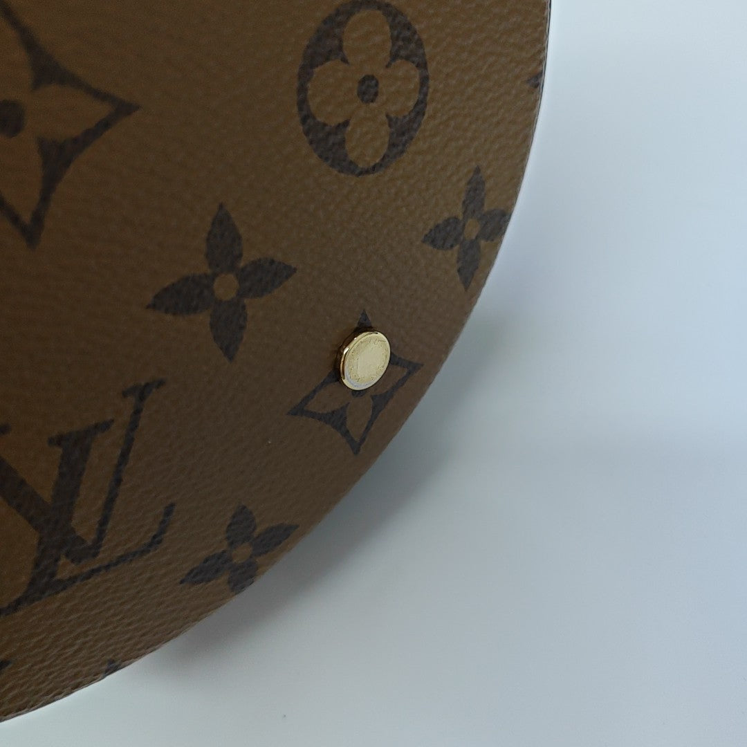 CANNES PM Monogram Coated Canvas Brown