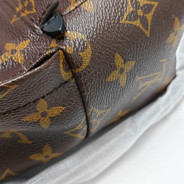 Authenticated pre-owned  PALM SPRINGS Mini Monogram Coated Canvas Brown - Backpack at Looply