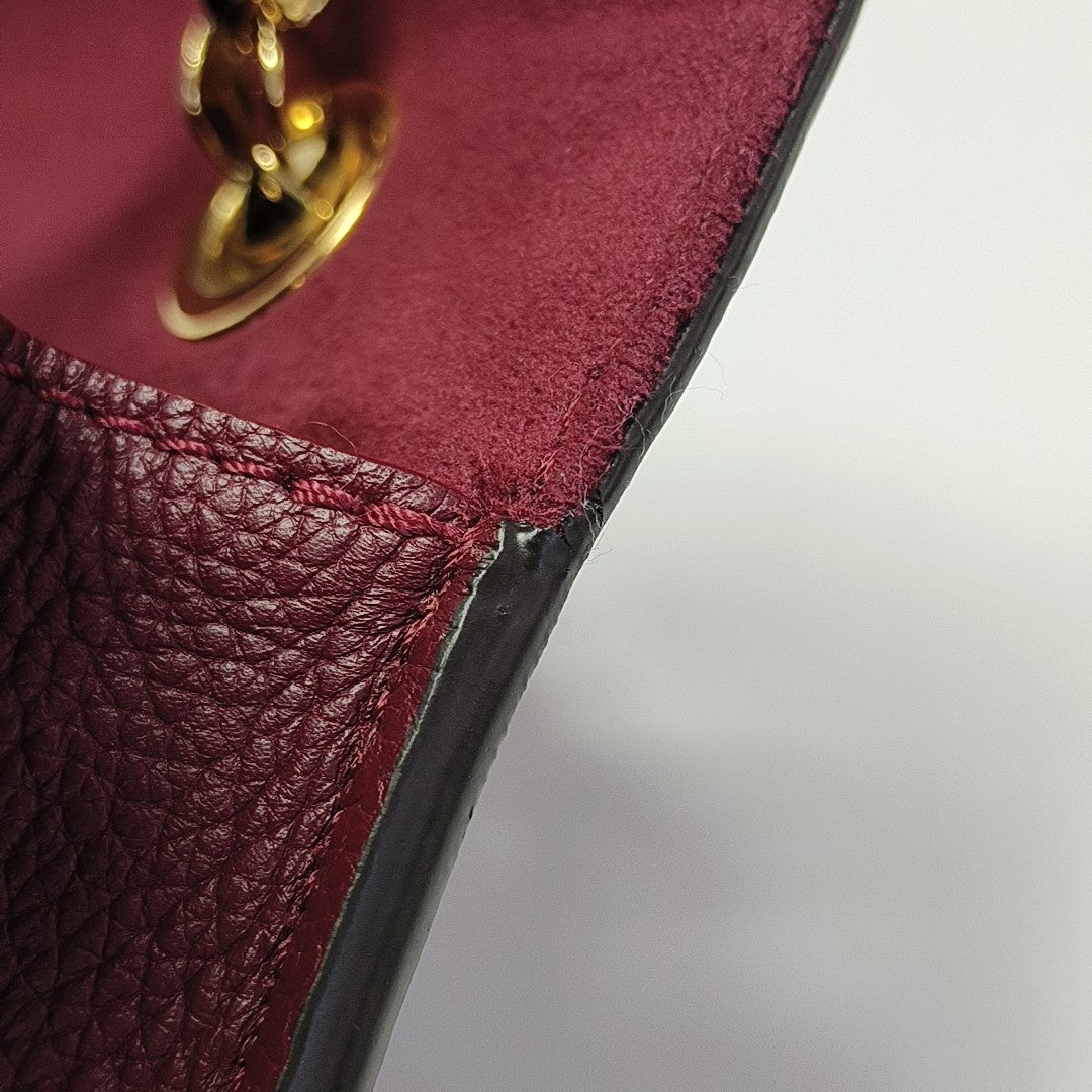 VICTOIRE Monogram Coated Canvas Brown