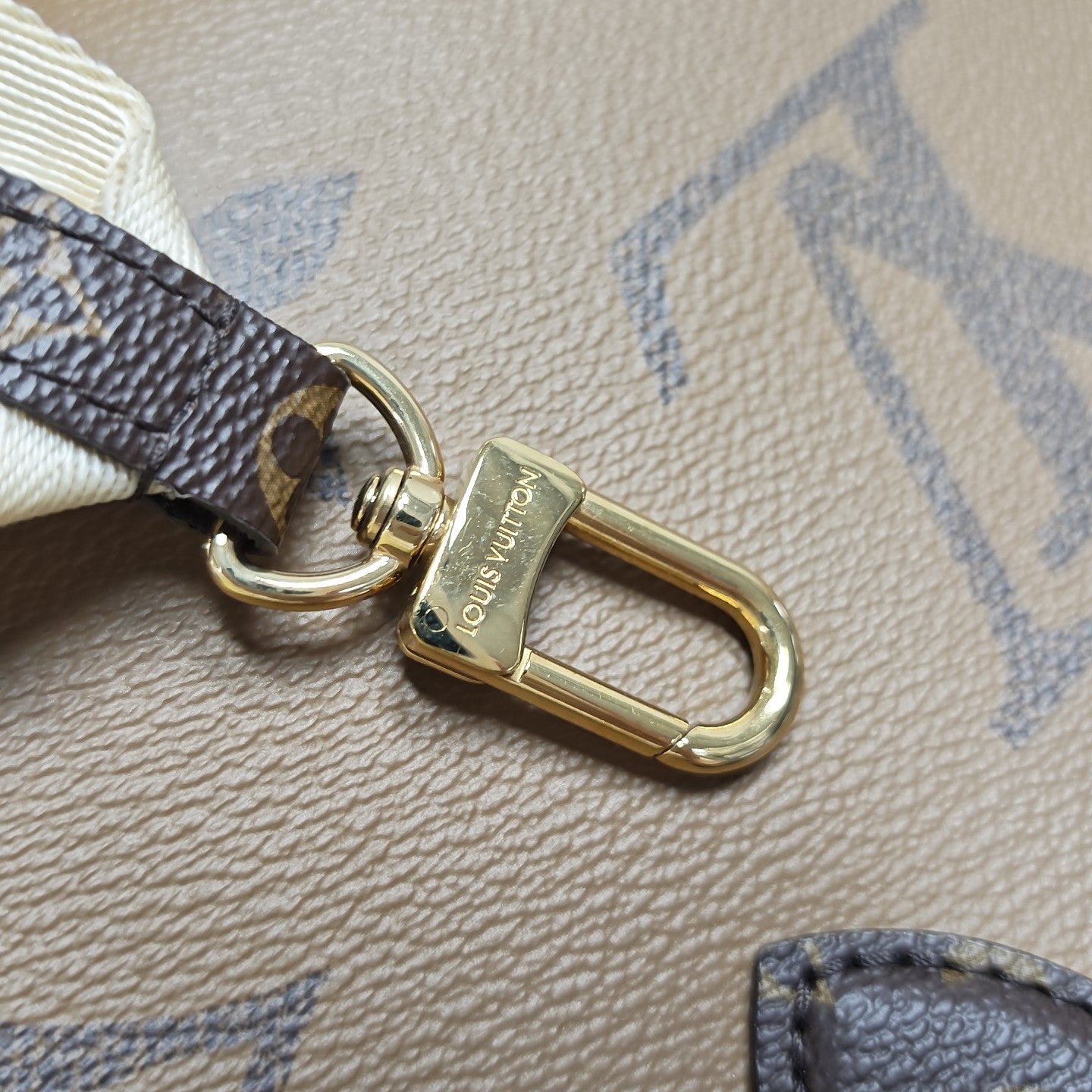 ONTHEGO PM Monogram Coated Canvas Brown