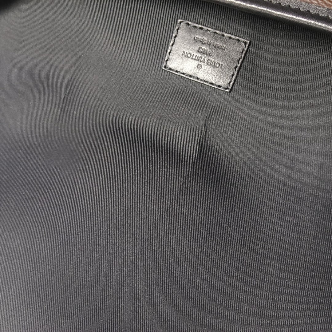 MAGNETIC Monogram Coated Canvas Brown