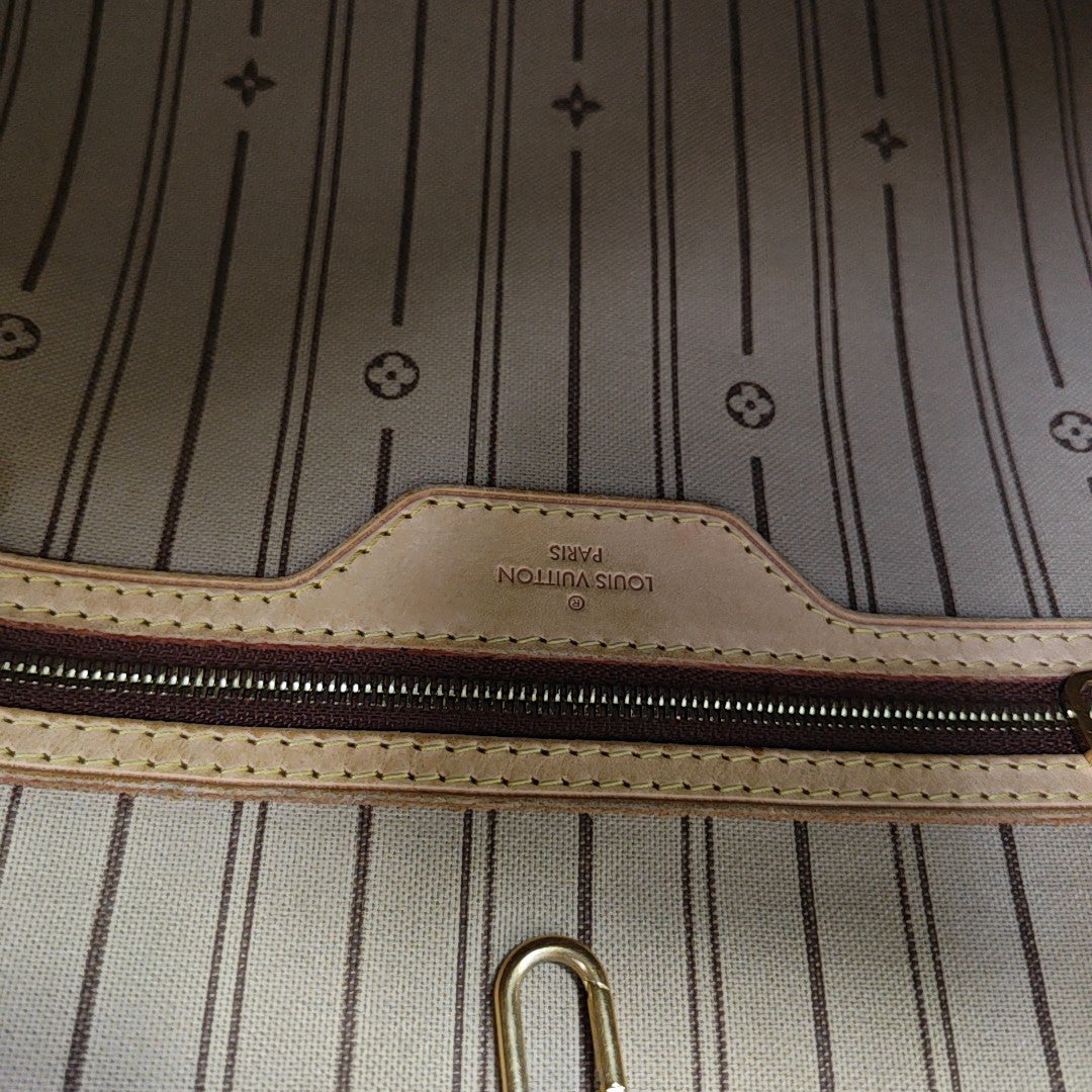 DELIGHTFUL PM Monogram Coated Canvas Brown