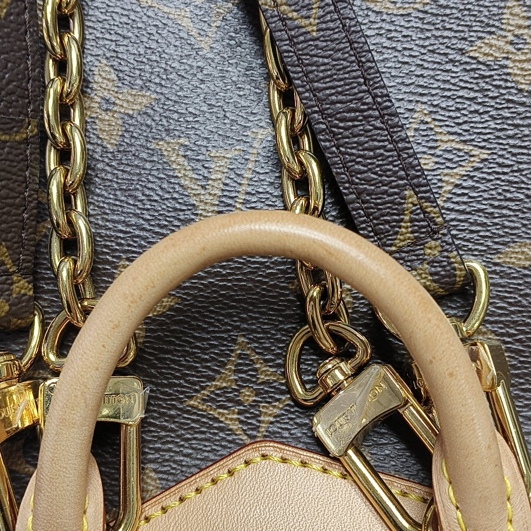 EXCURSION PM Monogram Coated Canvas Brown