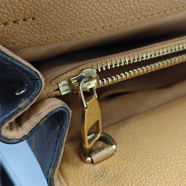VÉNUS Monogram Coated Canvas Brown