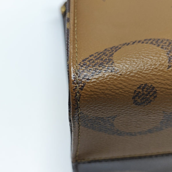 ONTHEGO MM Monogram Coated Canvas Brown